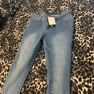 Ripped back pants. Blue denim jean